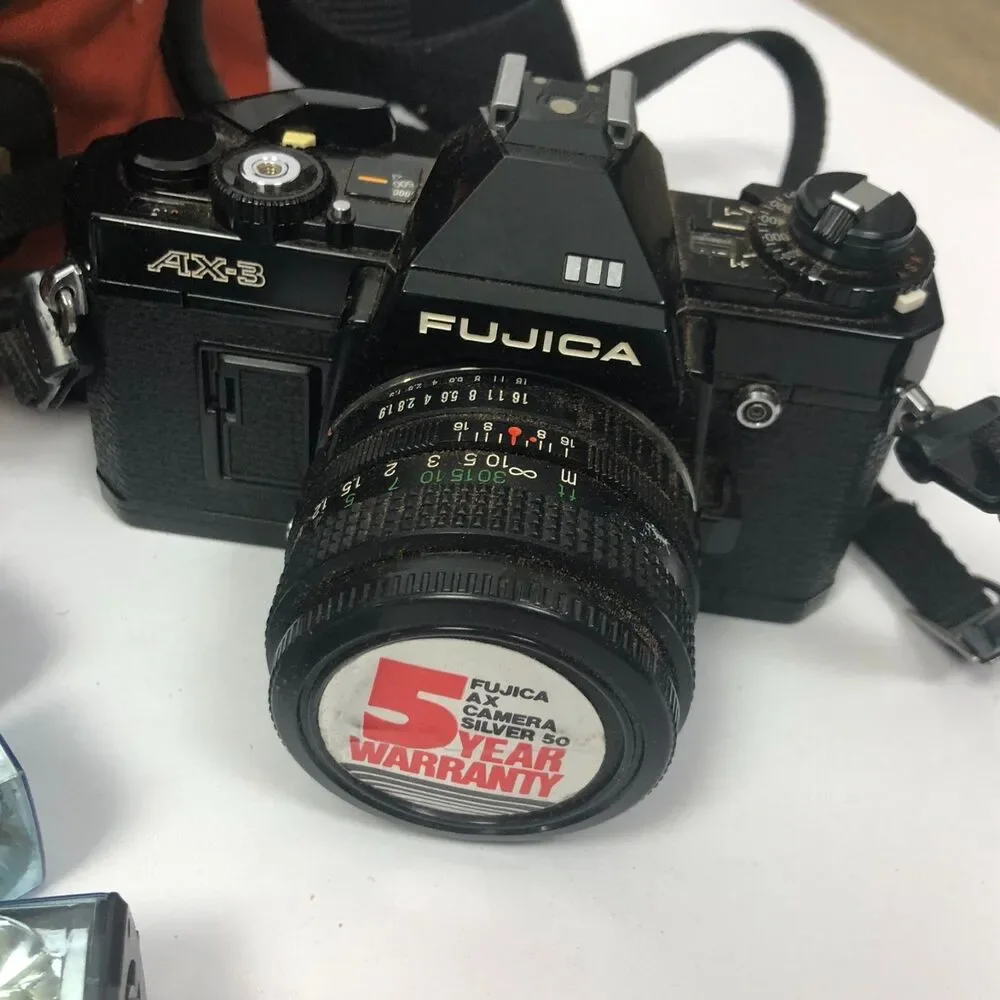 VTG Fujica AX-35mm SLR Camera w/ Bag Extra Lense Achiever Electronic Flash Bulbs